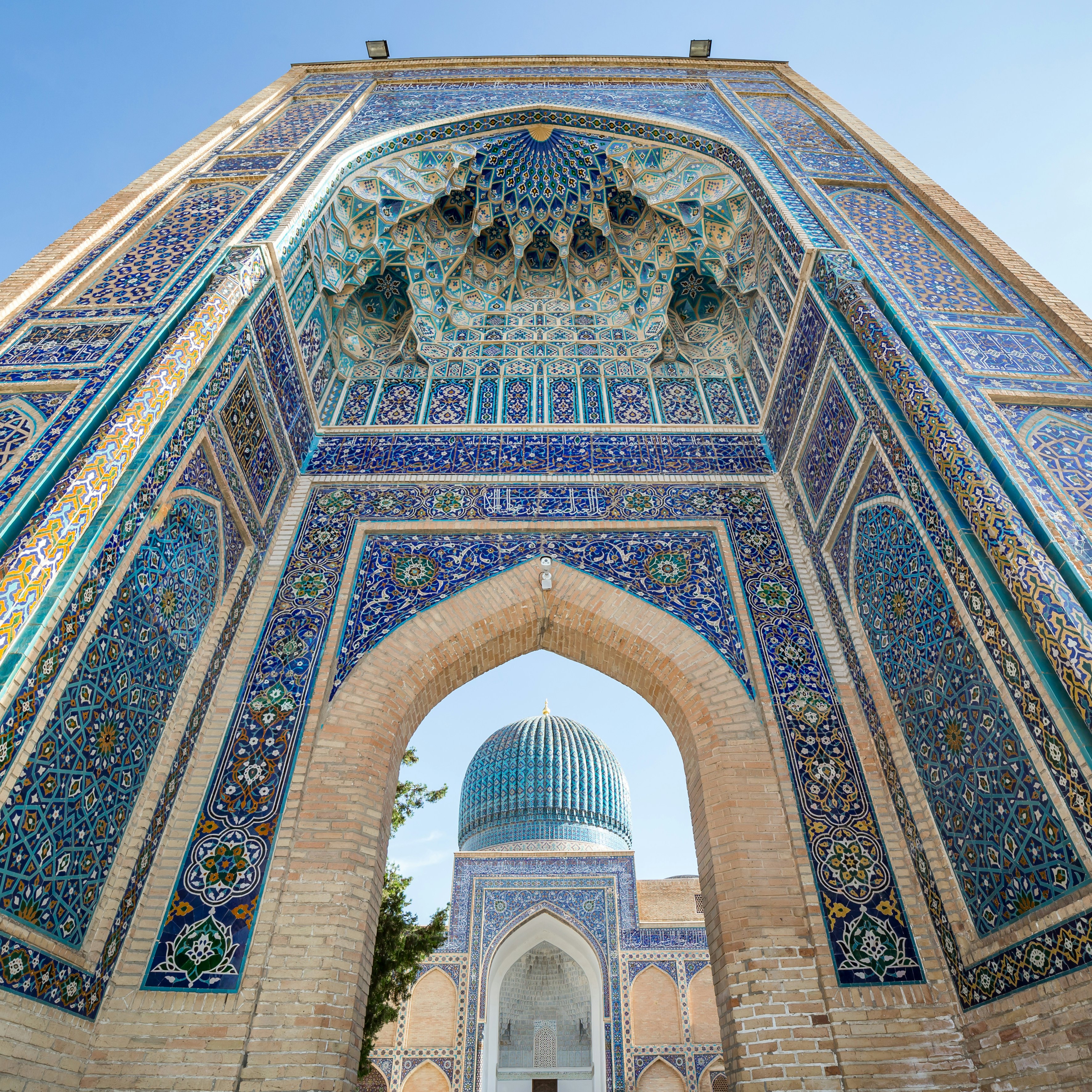 SAMARKAND, UZBEKISTAN - AUGUST 28, 2016: Gur-E Amir Mausoleum, the tomb of the Asian conqueror Tamerlane or Timur, in Samarkand, Uzbekistan
571103800
amir, amir timur, ancient, architecture, art, asia, attraction, building, central asia, ceramic, city, culture, cupola, decoration, detail, dome, gur-e, gur-e amir, heritage, historic, holy, islam, islamic, landmark, madrasa, madrasah, majolica, mausoleum, minaret, monument, mosaic, mosque, muslim, old, oriental, ornament, pattern, religion, samarkand, samarqand, tamerlane, tile, timur, tomb, tourism, town, travel, unesco, uzbek, uzbekistan